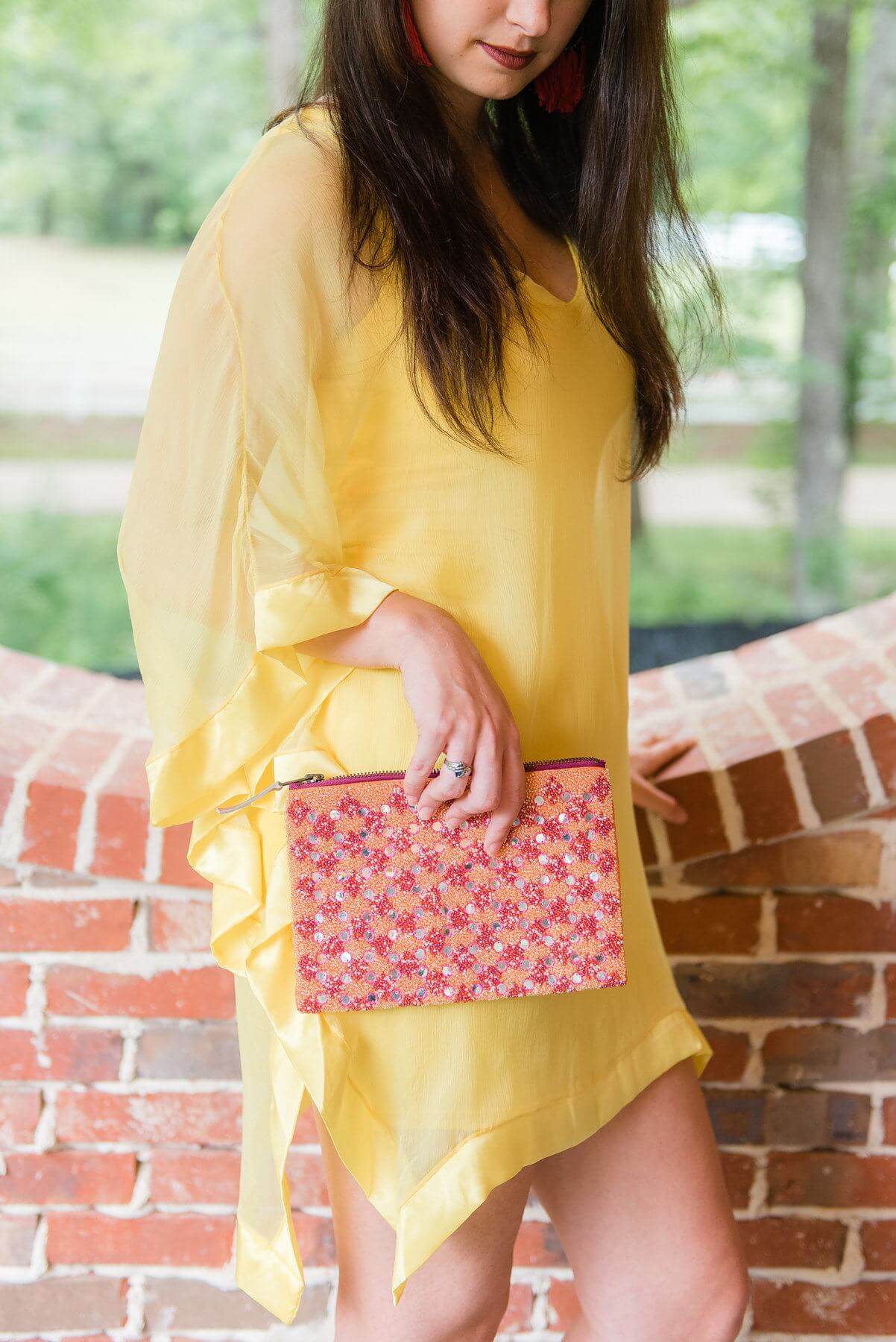 From The Clothes Tree by Deborah: Vibrant bohemian clutch, $120