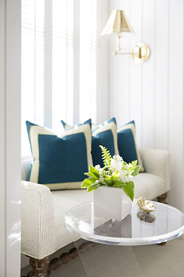 This beautiful bench is the perfect place to soak in the natural light that floods the bedroom.