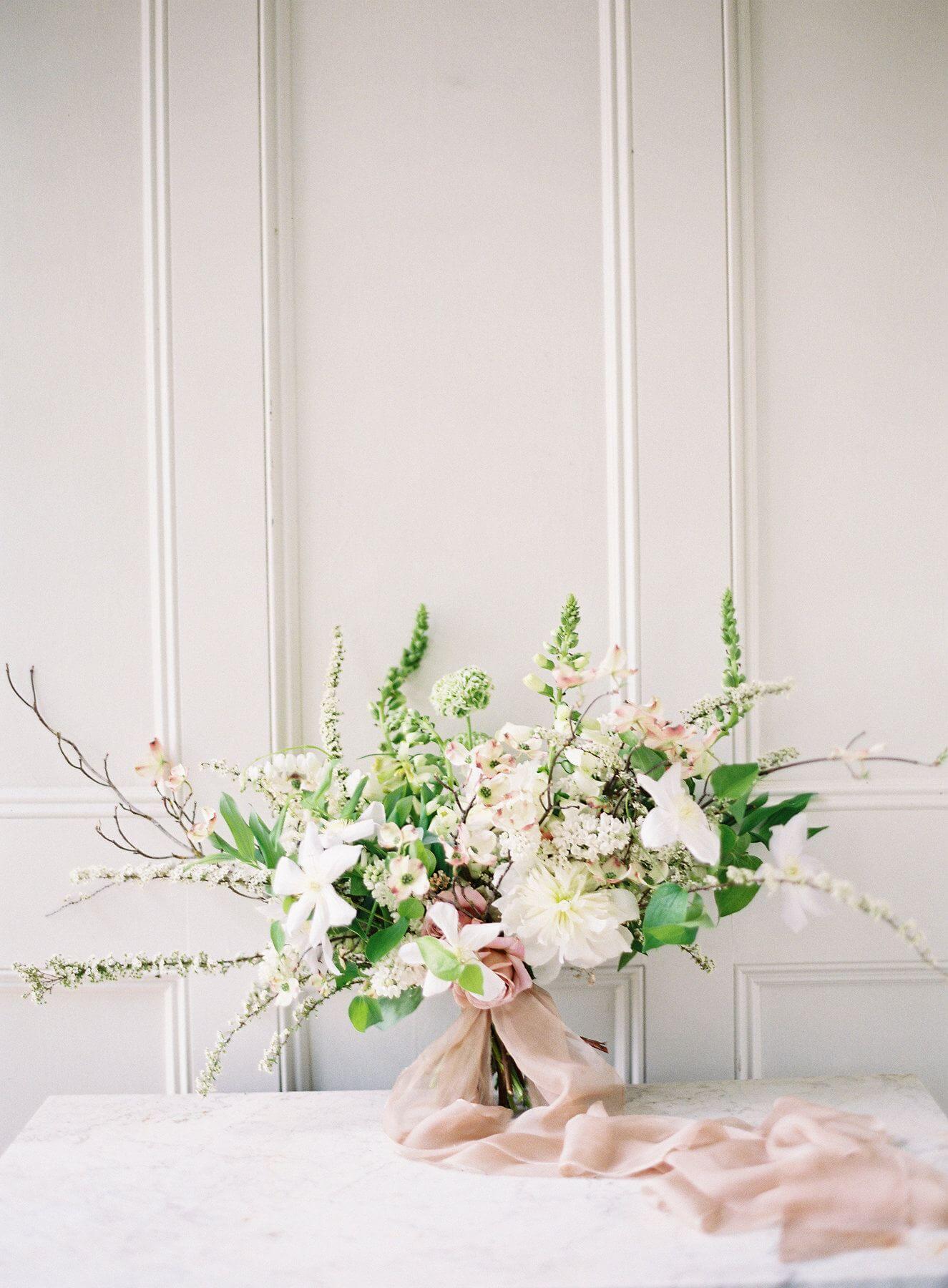 Marie couldn't say enough about her talented floral artist. "Holly with Rosegolden was amazing to work with. The floral design was a huge part of the ceremony and reception," she says.