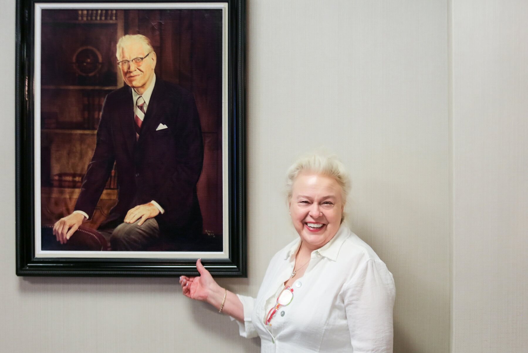 Star stands next to a portrait of Dr. Frist, Sr., founder of HCA and a man she first met when you was just a little girl.