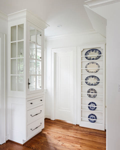 Additional storage space adds both practicality and beauty to this kitchen. Additional storage space adds both practicality and beauty to this kitchen.