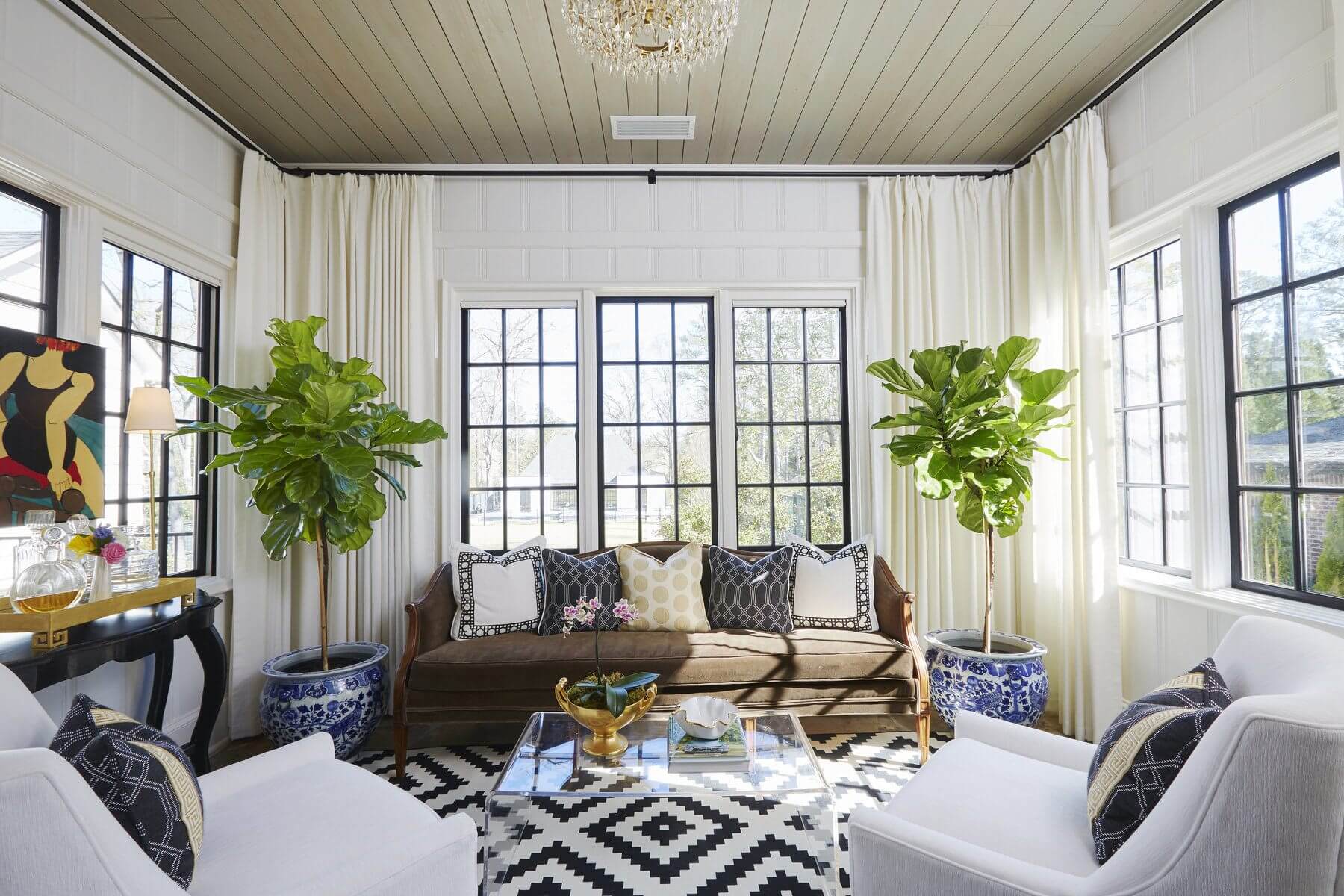 The sunroom offers an additional retreat with lots of natural light.