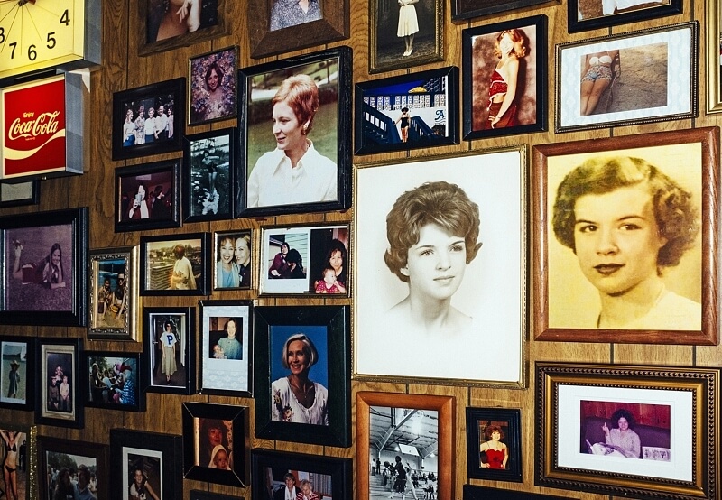 Birmingham's Hidden Bars – Mom's Basement walls are covered with photos of the bar's namesake. Birmingham's Hidden Bars – Mom's Basement walls are covered with photos of the bar's namesake.
