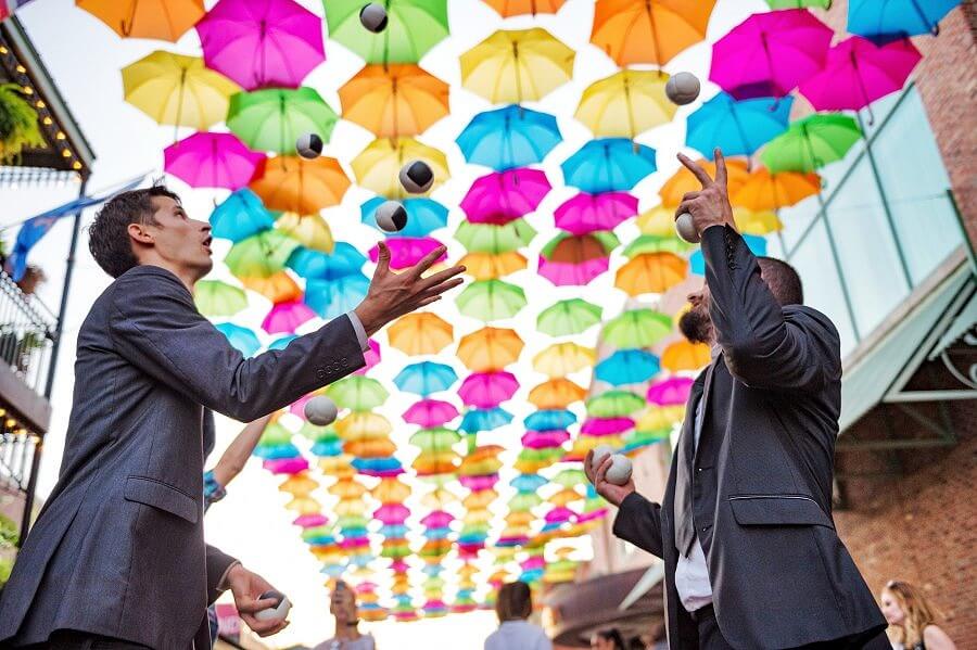 Pensacola Foo Foo Fest Street Performers Under Umbrella Sky