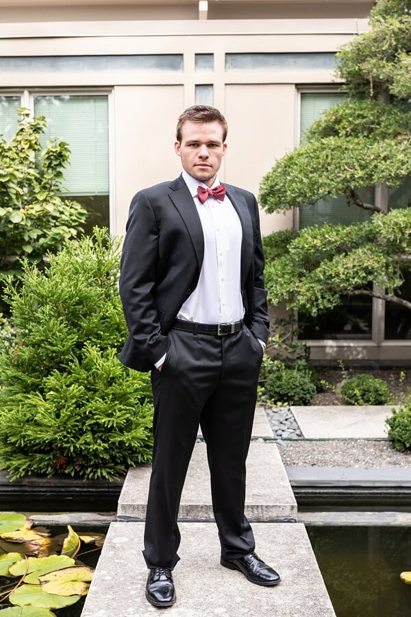Bo is looking dapper in his custom suit and red bow tie to complement. 