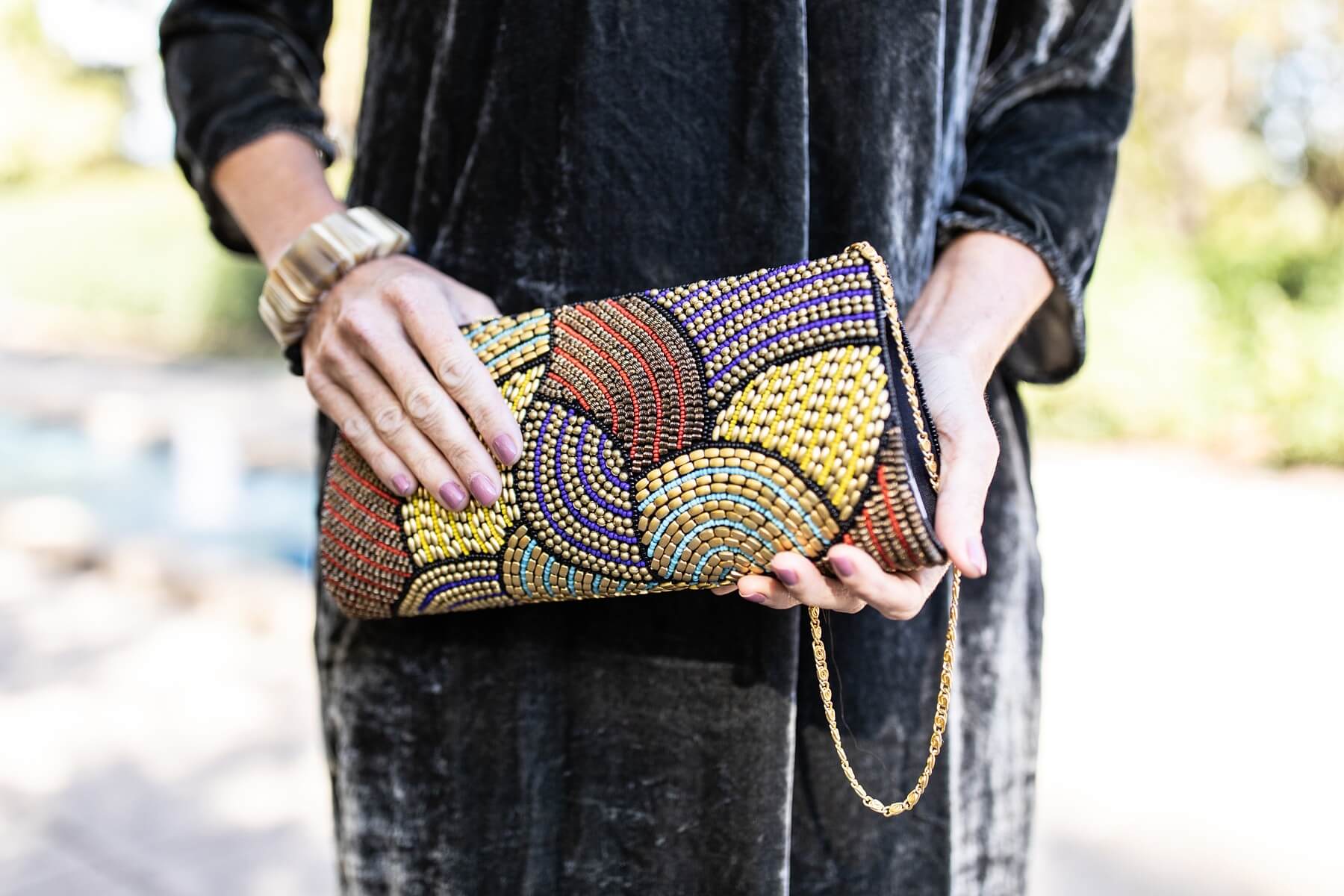A beaded, patterned bag with a solid dress is the perfect mix. 