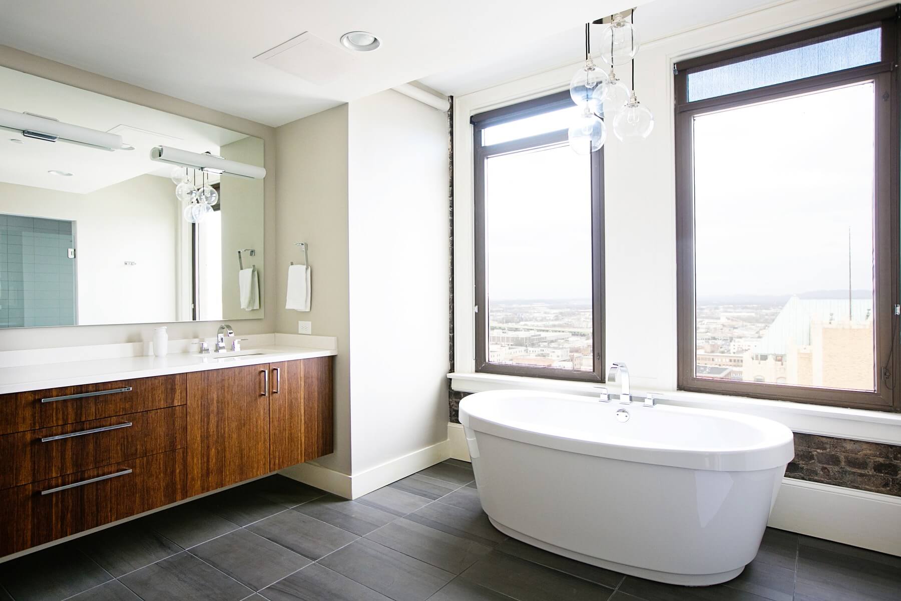 This gorgeous bathroom offers one of the best views of the Magic City from the 18th floor of the John Hand building. Image: Creature