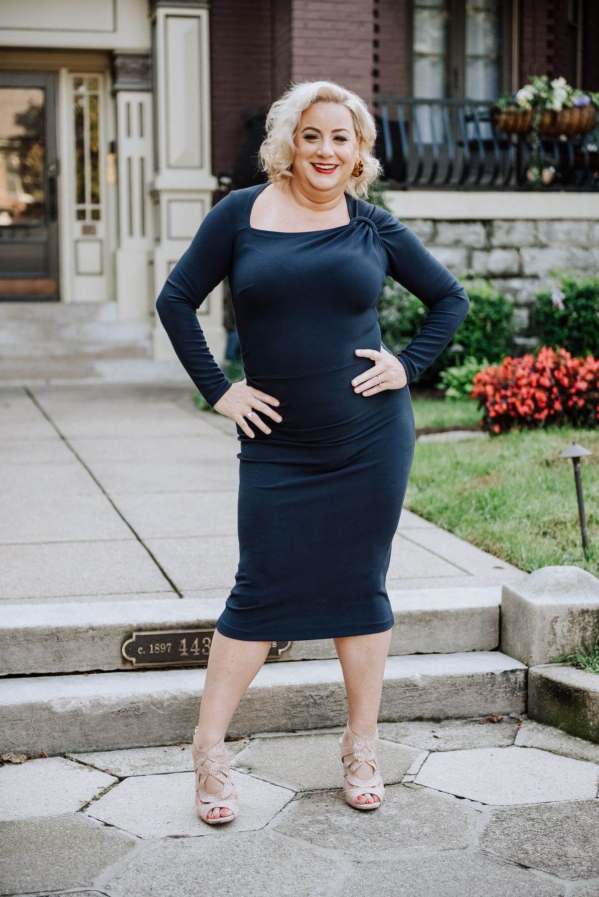 On Jessica from Rodes: Navy blue midi dress, $695 what to wear to october events in louisville