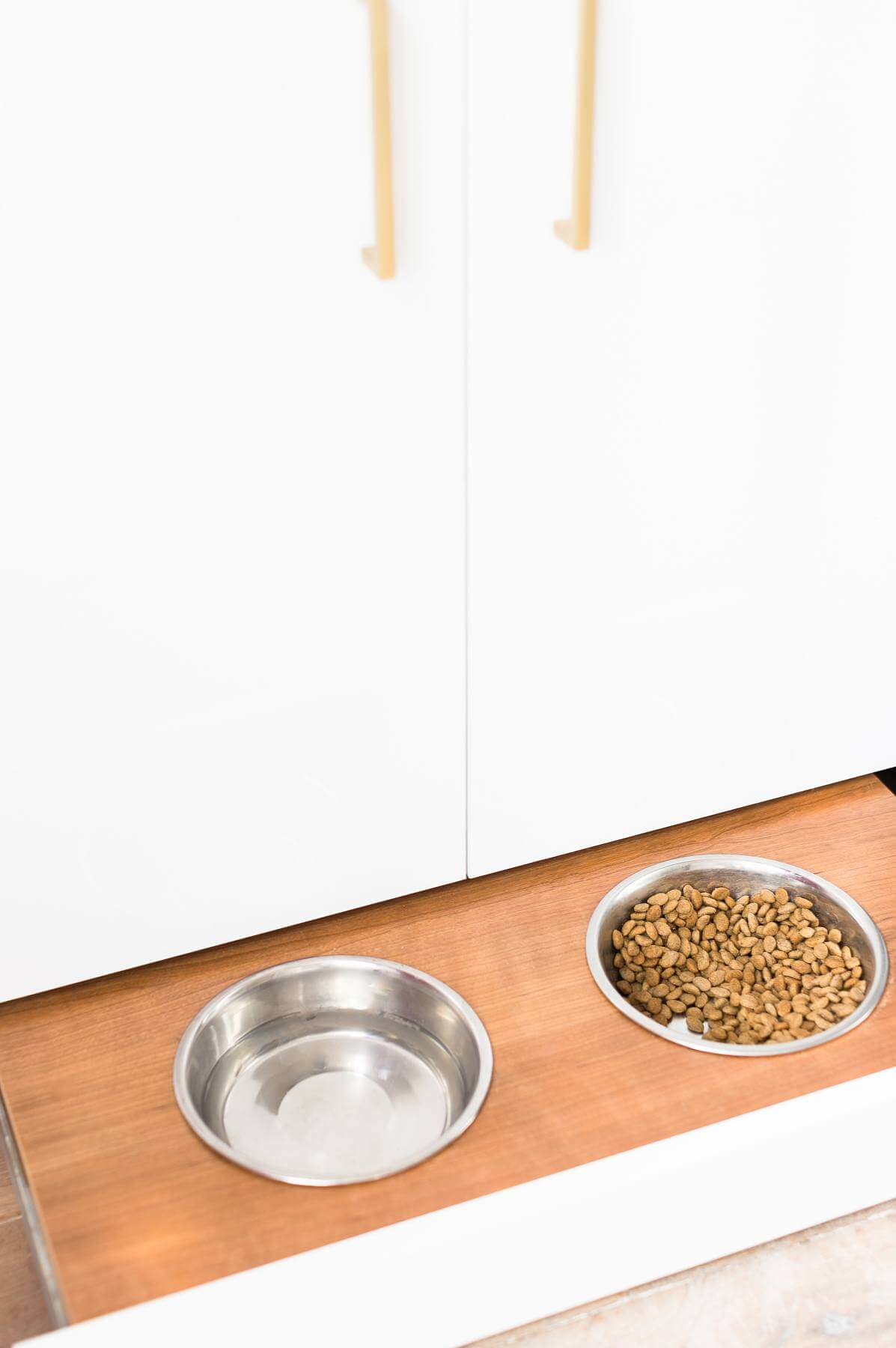 No one will even know you have a pet with a hideaway pet feeding station! Custom Design Elements