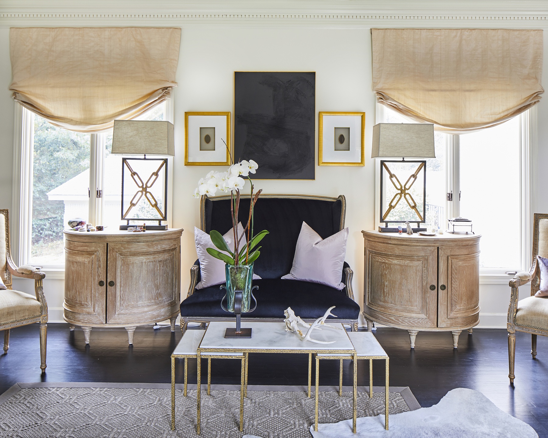 Gorgeous antique pieces intermix with modern touches for a chic yet inviting look.