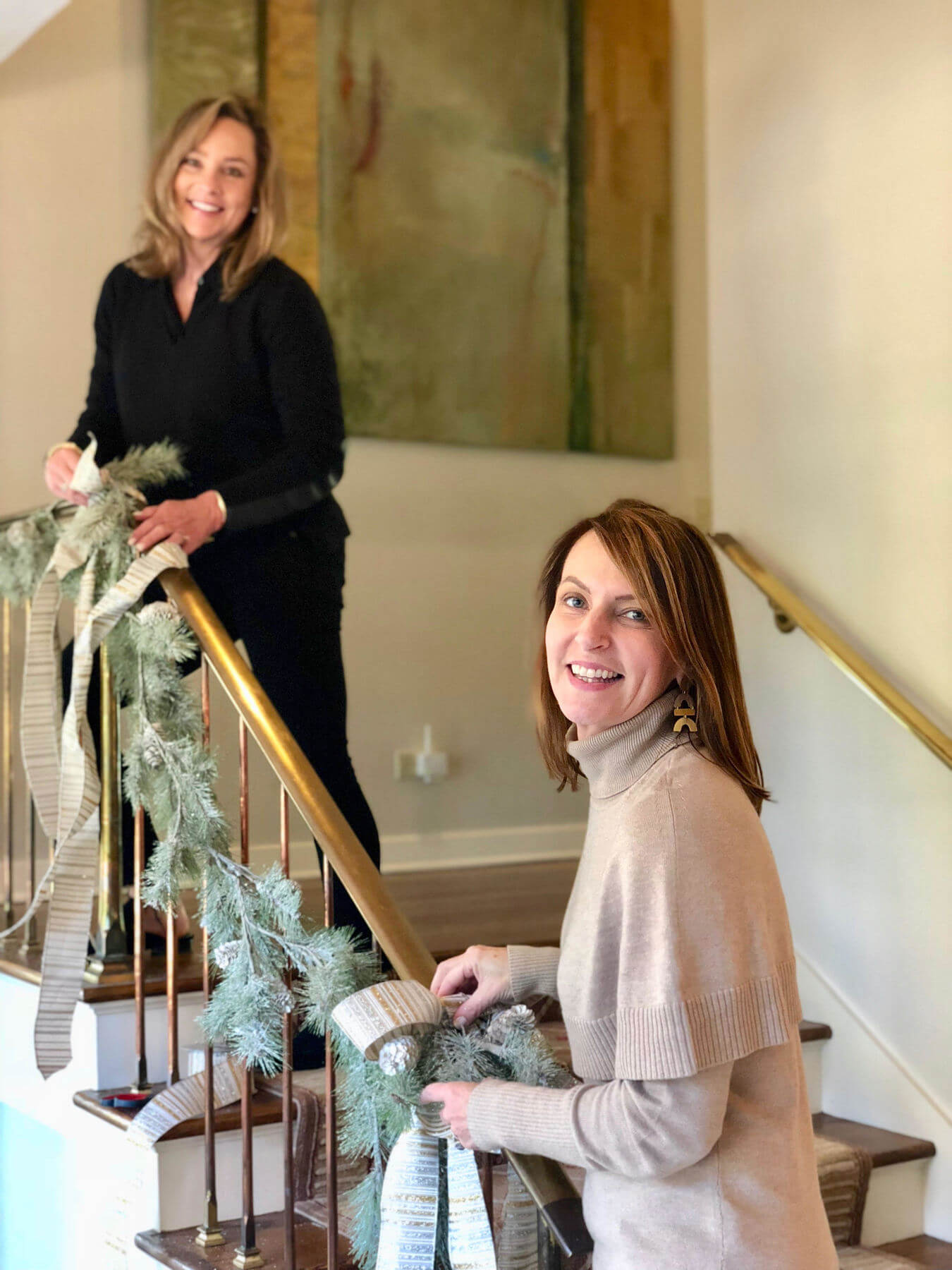 Courtney Fussell and Karen Klawinski of Lisa Mallory Interior Design bring holiday cheer! 