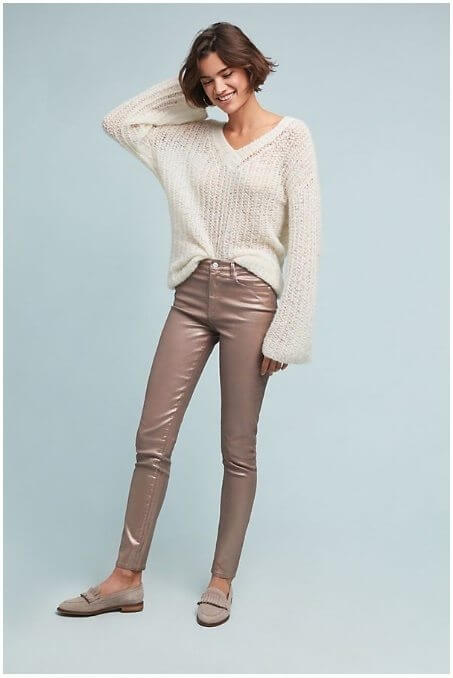 Basic loafers and neutral pants anchor this oversized sweater, and the pearlized pant adds a fun touch of personality. Image: Anthropologie 
