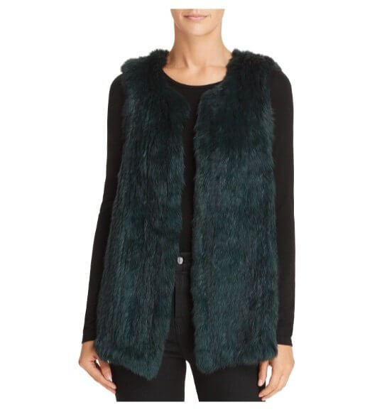 Simple black basics lay the foundation for this personality-packed emerald fur vest. Image: Bloomingdale's