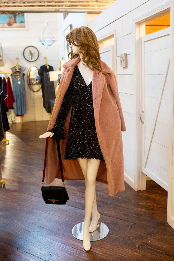From Work the Metal: Faux fur pale pink coat, $89; black bell sleeve dress, $46; classic black purse, $59 what to wear louisville february