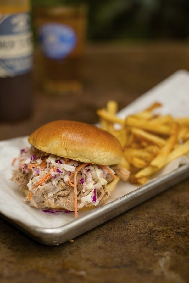 Classic pulled pork sandwich, slaw, and fries from Martin's barbecue in Birmingham