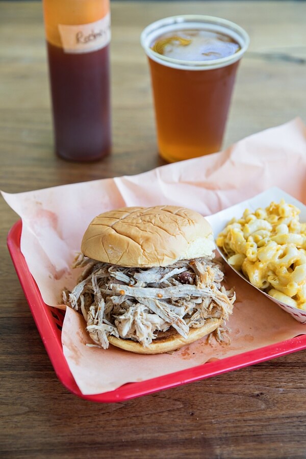 Pulled pork sandwich, mac 'n' cheese, and beer at Rodney's barbecue in Birmingham