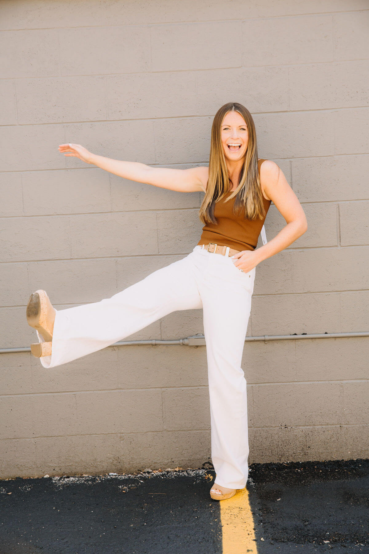 When it comes to white flare jeans, we say there are no rules with the seasons. 