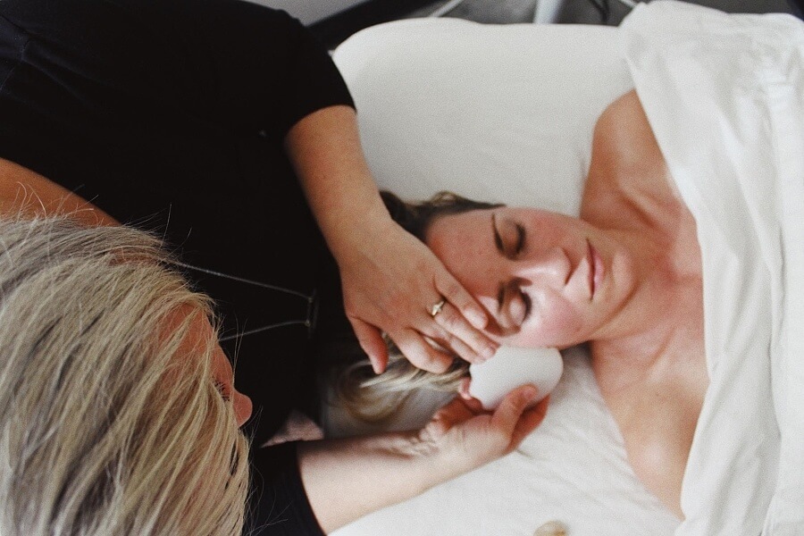 Kari Zwickel’s facial Gua sha in practice. She says implementing this technique has completely changed her facials. Photo courtesy of Kari Zwickel. gua sha facial