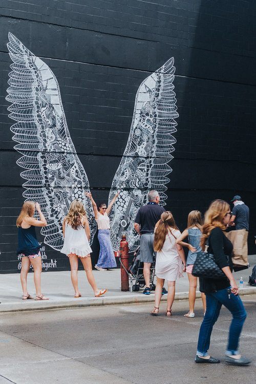 WhatLiftsYou wings in Nashville The ever-popular "WhatLiftsYou" wings mural in The Gulch draws many a tourist.