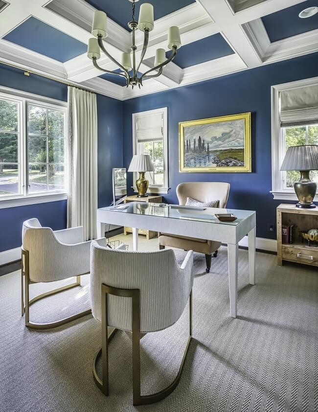 "The study has a little splash of color. We try to talk all of our clients into throwing a little color or wallpaper in to stray away from that ‘all-white’ look," Alan tells us. Castle Homes