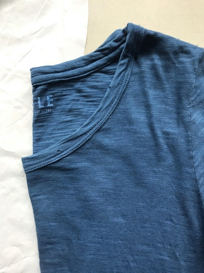 Winona sent us gorgeous samples to wear, to make sure they lived up to our standards. As you can see in this photo, the indigo shade is deep but not super dark. And there is a purposeful distressing to the fabric, with tiny holes at the seams for that popular, vintage/modern lived-in look. ** This is the truest representation of the color of these shirts. Distressed indigo-dyed t-shirt