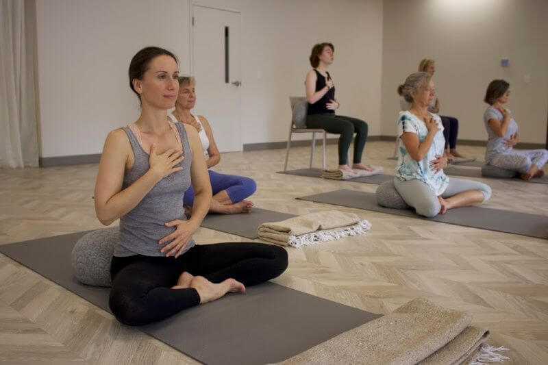A variety of yoga classes are offered at Practice Works, as well as meditation, Tai-Ji Quan, sound bath, Qi Gong and more. Image: Nicole Rossi Yoga classes at Practice Works
