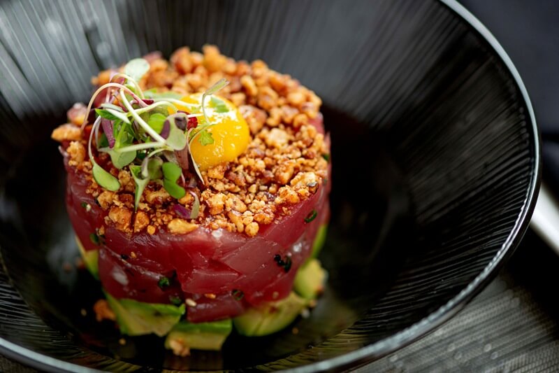 Start with the Hawaiian Poke Tuna. Image: O-Ku Hawaiian Poke from O-Ku Nashville