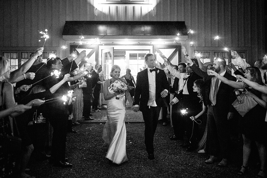 Alex reminds us it's ok to untuck the shirt and live a little — especially on your wedding night. The newlyweds exit their Charlottsville winery wedding amongst sparklers
