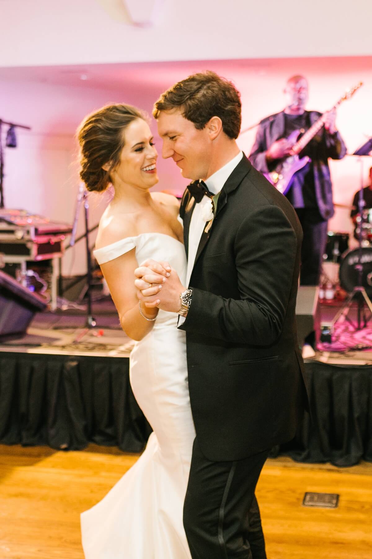 The bride and groom grin their way through their first dance to “You Are the Best Thing.” It’s a classic for a reason—this song is just the perfect first dance tune! bride and groom dancing