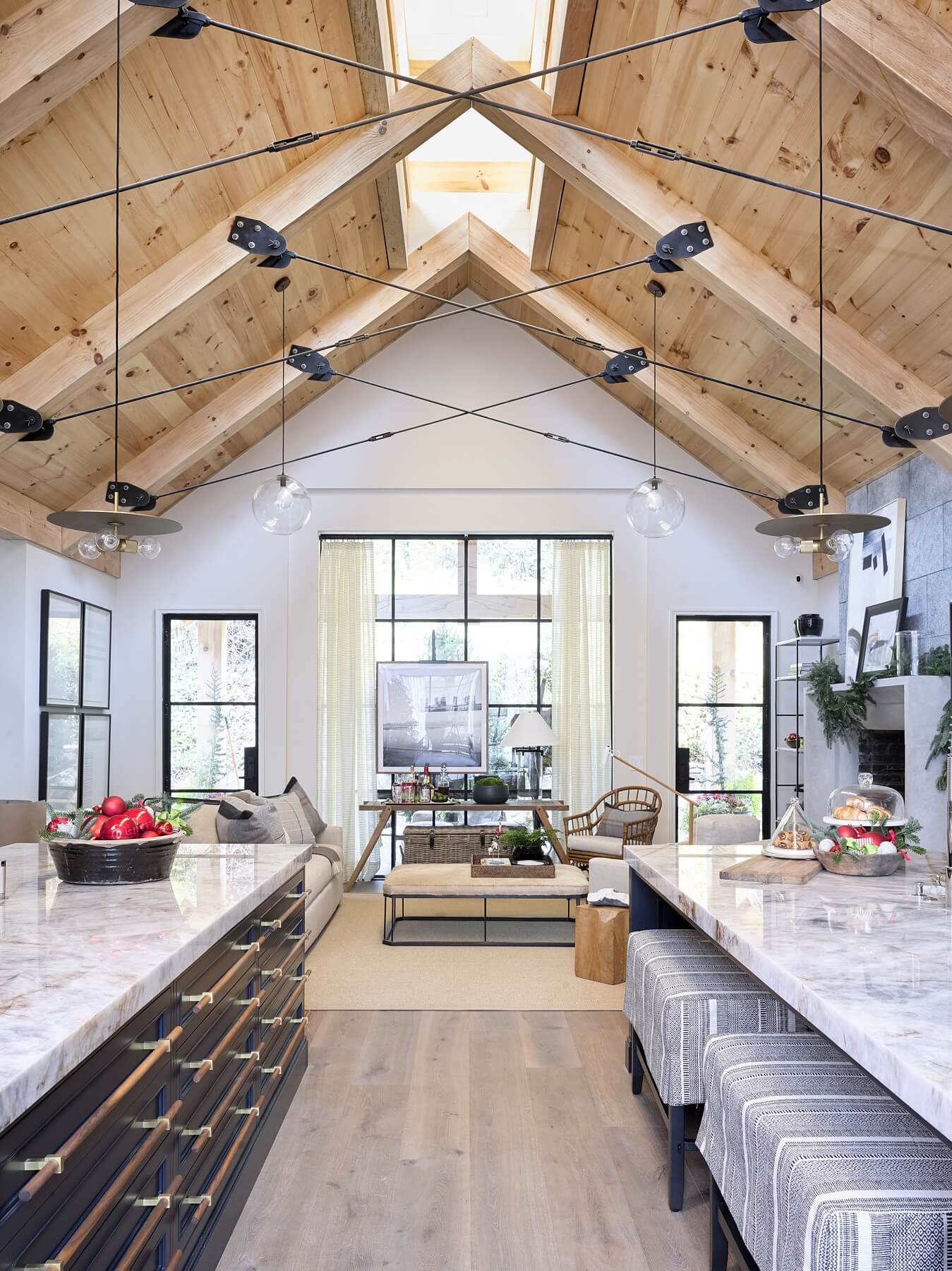 Not one but two islands in the kitchen designed by Holt Interiors offer ample room for holiday food prep and entertaining. Photo via David Christensen. 2019 Home for the Holidays Showhouse in Atlanta
