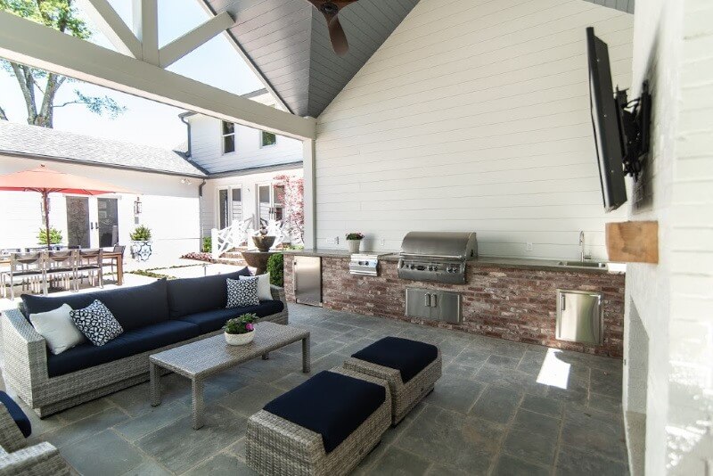 Full kitchen, TV fireplace and more in outdoor living area