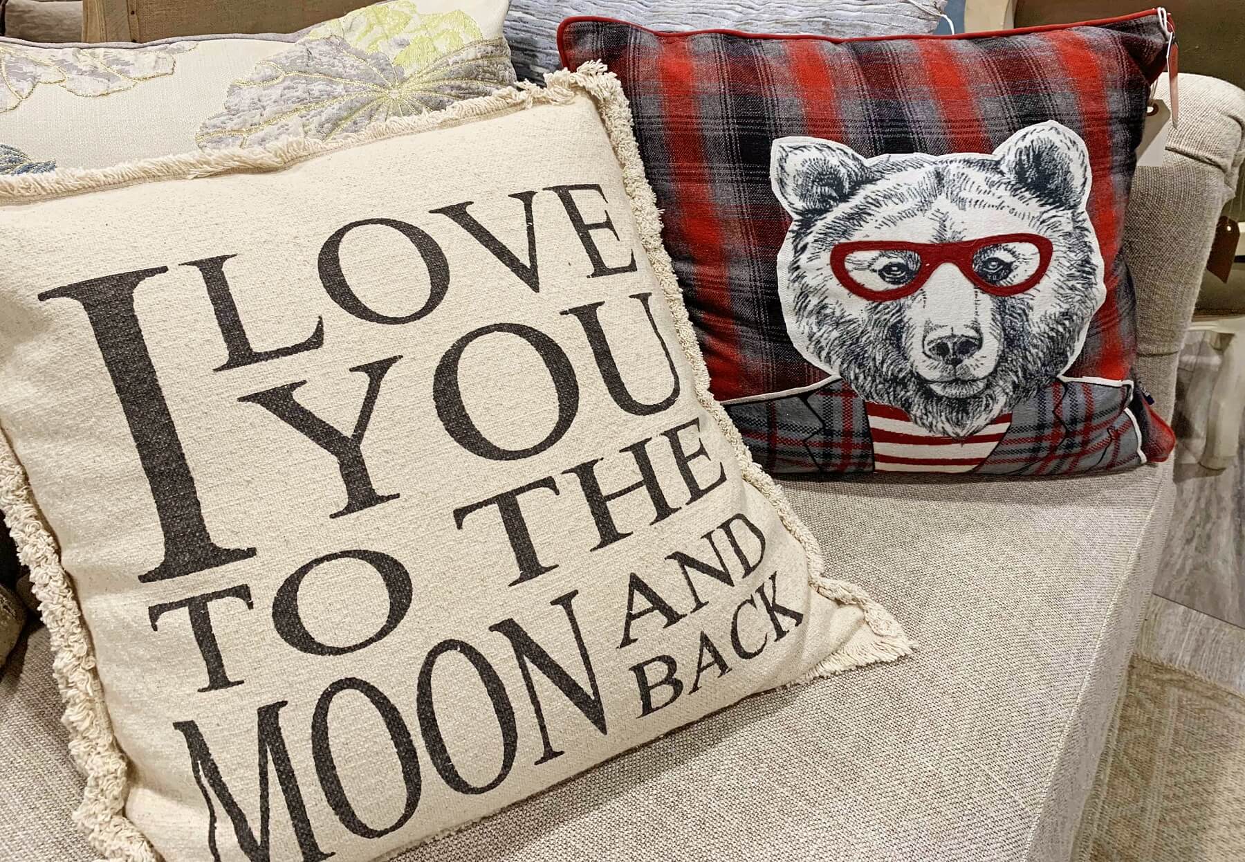 You’ll find lots of pillows to accent any color palette. How cute is the bear with glasses? pillows- Cotton Row Uniques