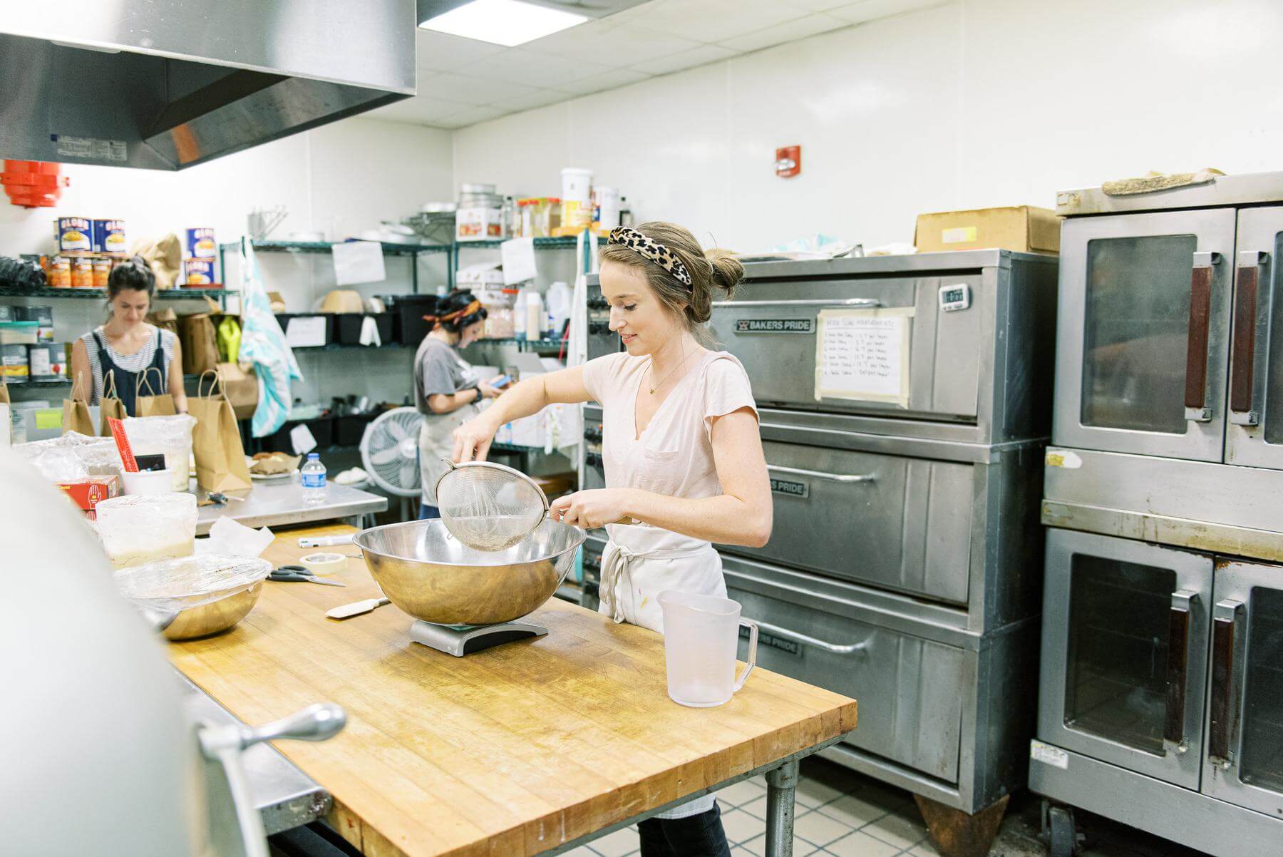 Mallory Webb mixing naked cakes