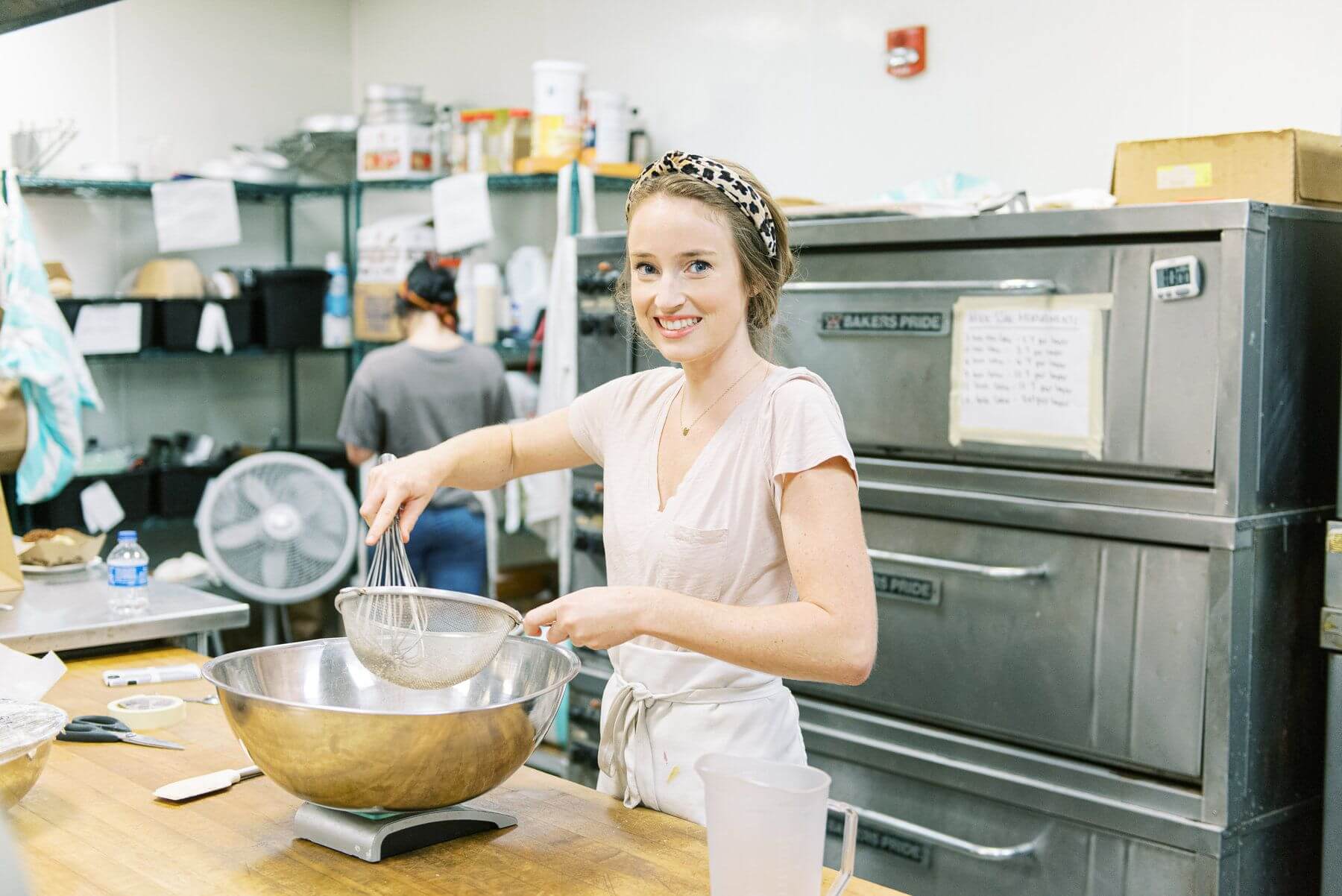 Mallory Webb of Daughters Baking, makes naked cakes