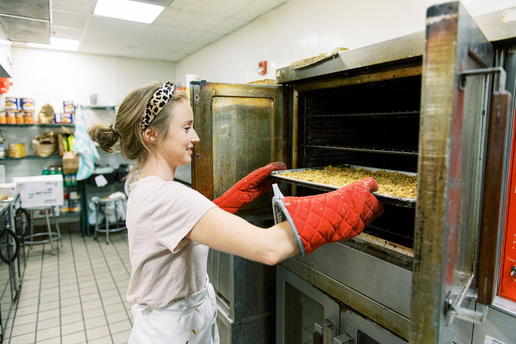 Mallory Webb- putting dessert in the oven