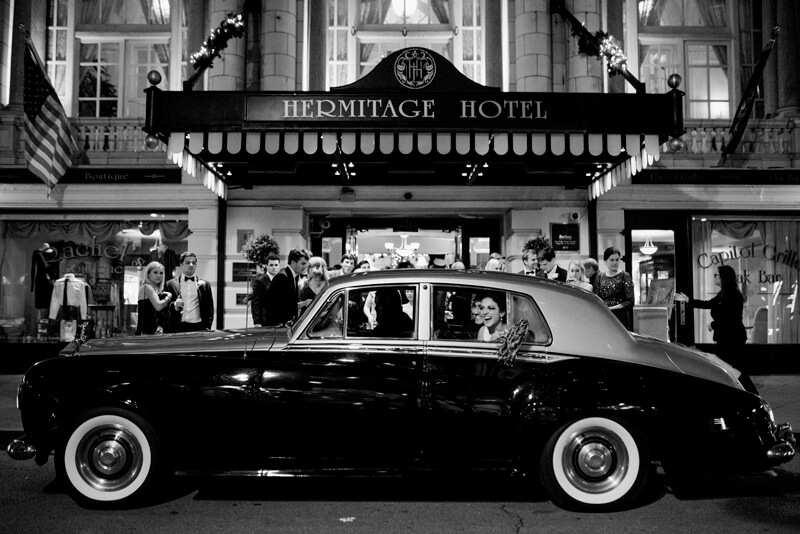 ... before riding off into the night. Exiting the Hermitage Hotel