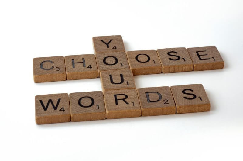 Your words have an impact, so choose them wisely! Image: Brett Jordan | Unsplash Choose your words Scrabble tiles