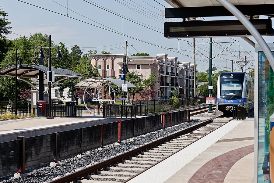 Charlotte's light rail system was smartly built before the demand picked up. Now, it's treasured by locals and connects many different neighborhoods throughout the city — all the way north to UNC Charlotte. Image: sganwdesign.com Charlotte light rail