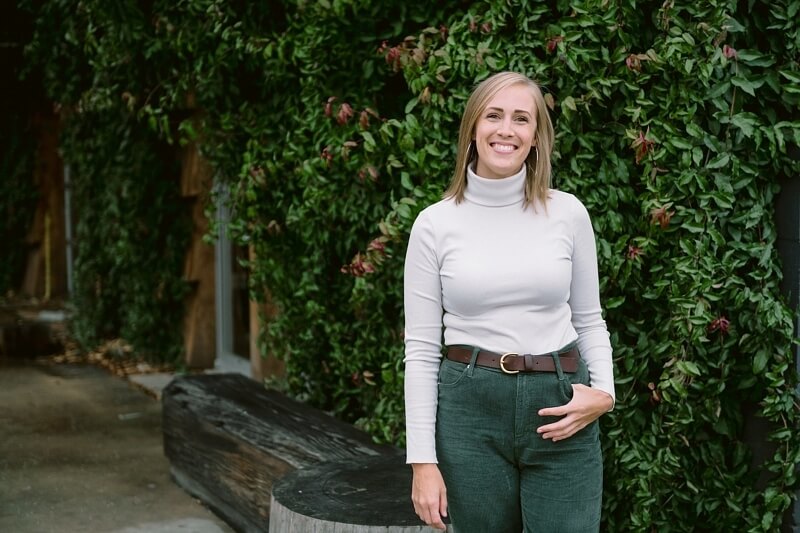 Marika feels lucky to be a part of the booming art scene in Birmingham. Image: Eric & Jamie Photography Marika Austad posing in front of greenery