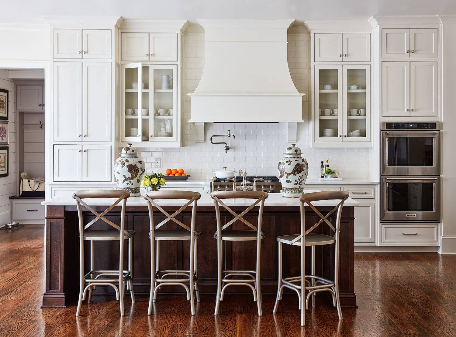 Designer Maggie Griffin practices what she preaches. Notice this kitchen filled with canisters, bowls and trays for a clean, tidy look. Image:Brian Bieder. Get organized- kitchen
