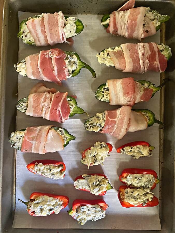 Spinach and Artichoke stuffed jalapeños and baby bell peppers