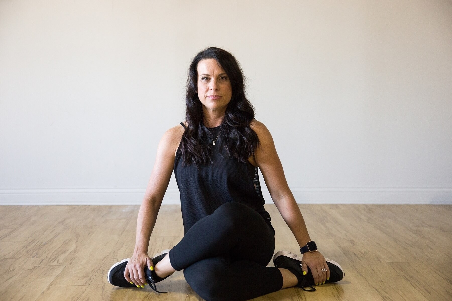 Jaime has a Facebook page where she gives daily tips and encouragement. She also has a YouTube channel where she streams workouts! Image: EyeWitness Photography Jaime Warren stretching-Fitness Influencers