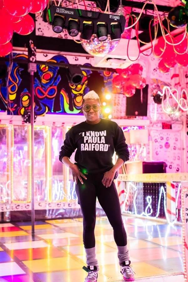 Paula Raiford posing in Paula & Raiford's Disco