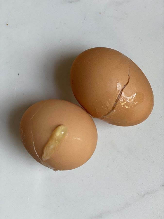 Two frozen shells with yolk — strange ways to cook eggs