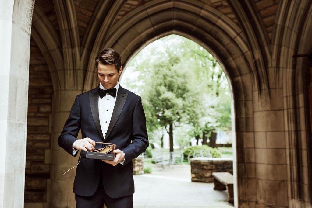 “Matt’s sort of a sentimental guy, so I think he really appreciated having all of that written down, so we can always remember and recall that," Ellen says of the journal she gave him. groom reads journal given to him by bride
