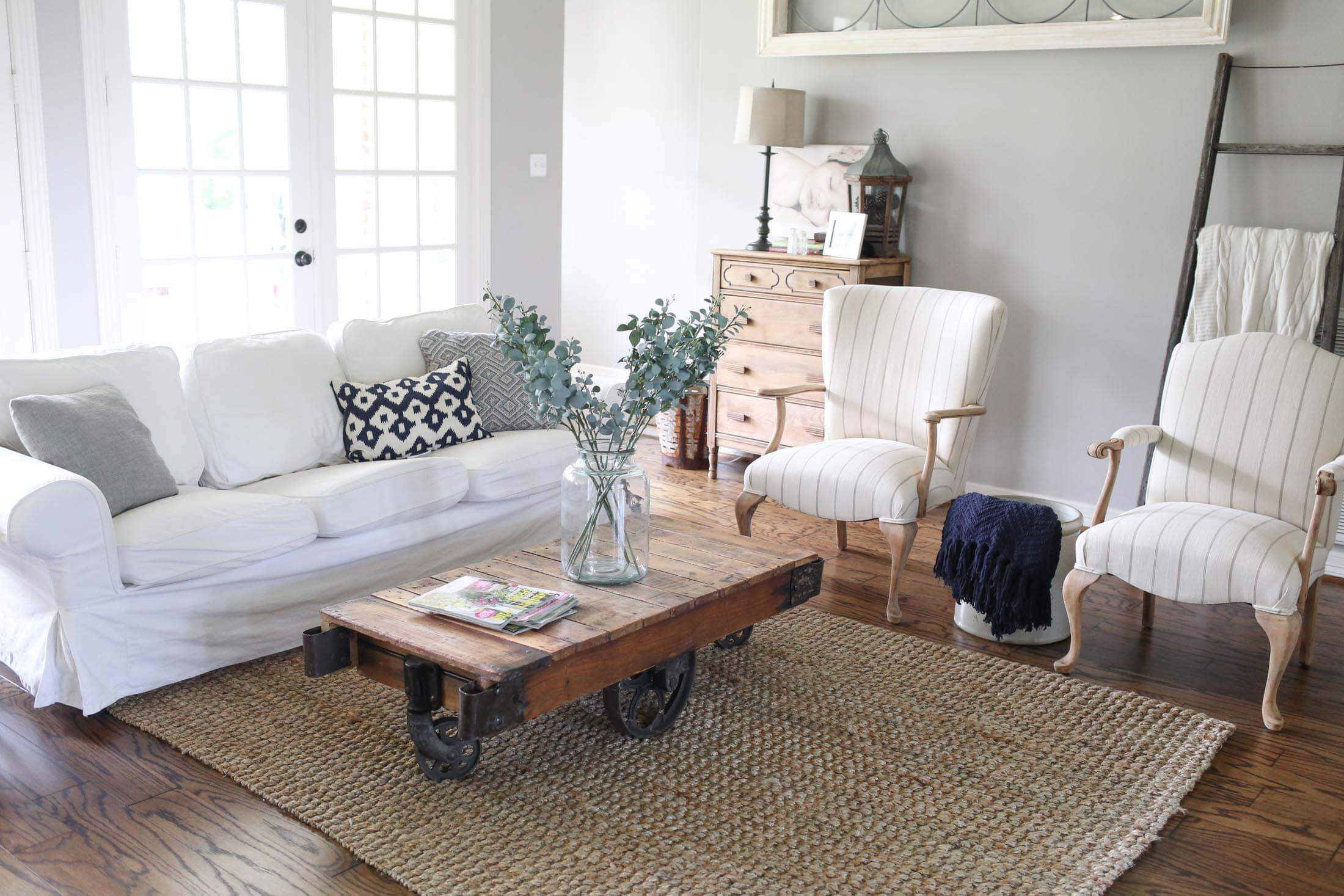Antique side table next to couch