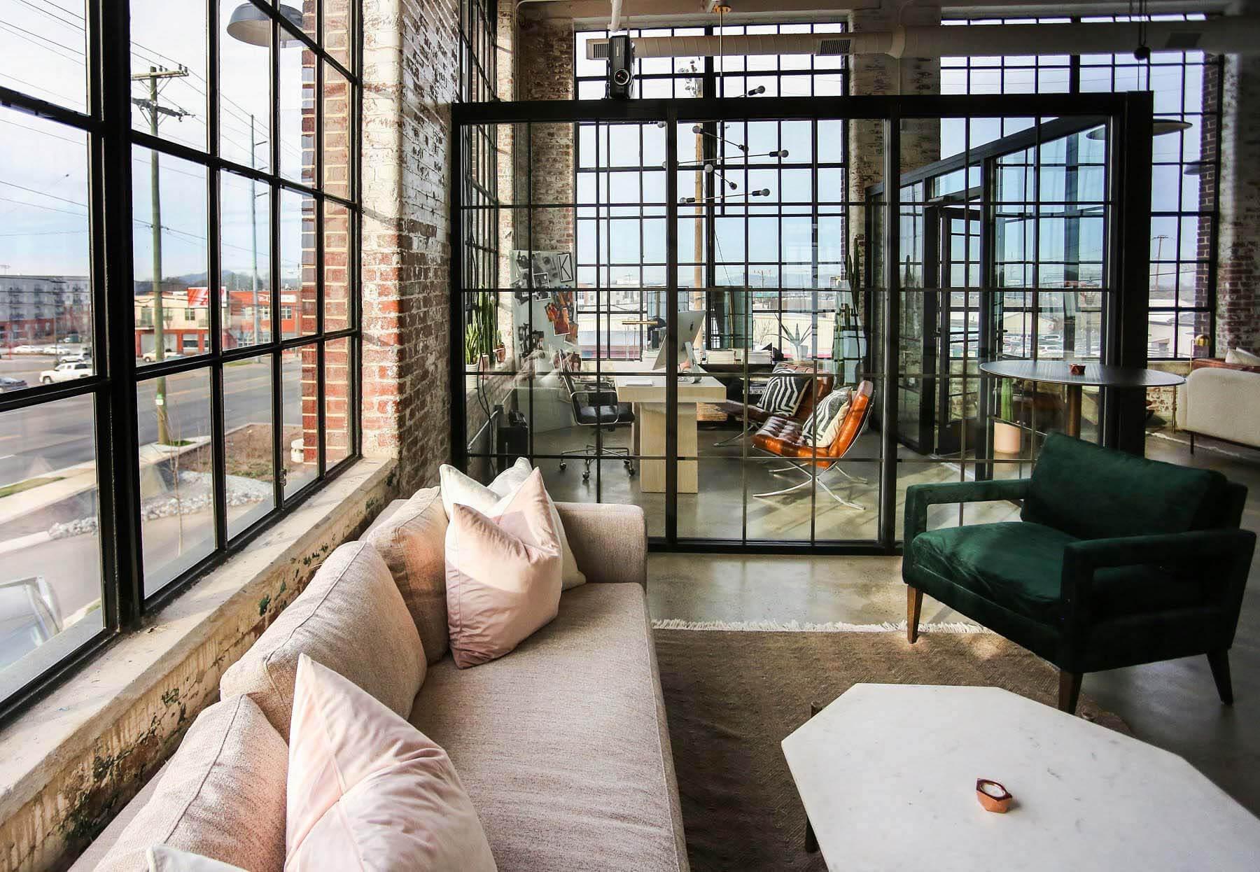 The open floor plan and stunning windows at L&L Market make for a shop with a view. Inside L&L Market store, Happily Grey