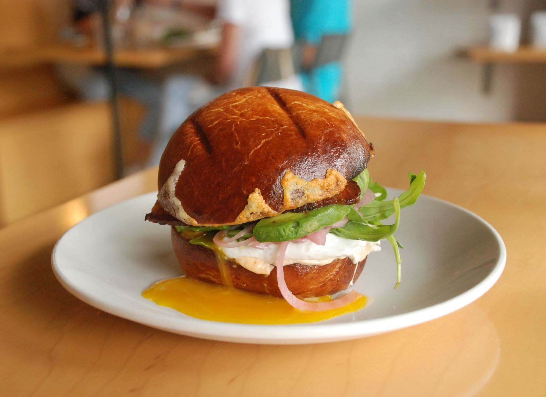 Expect mouthwatering morning bites, like the breakfast sandwiches and breakfast tacos, at Steadfast Coffee. Both will wow. Image: Steadfast Coffee A breakfast sandwich from Steadfast Coffee