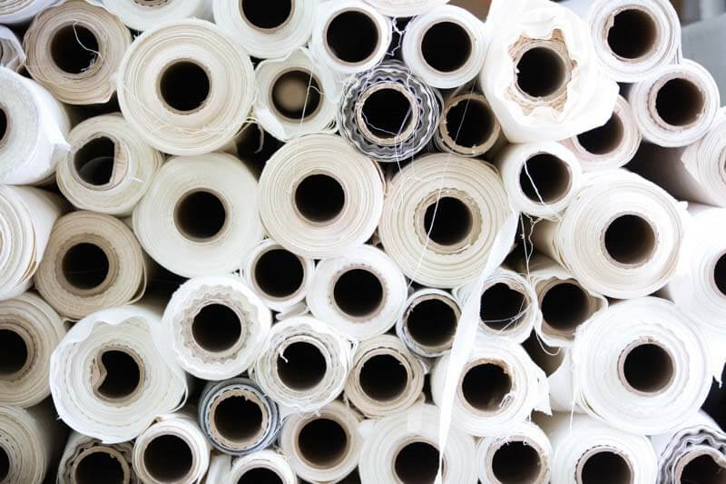 Because they grow and gin their own cotton, Red Land Cotton can make sure they utilize the best quality cotton for its products. Pile of Red Land Cotton fabrics