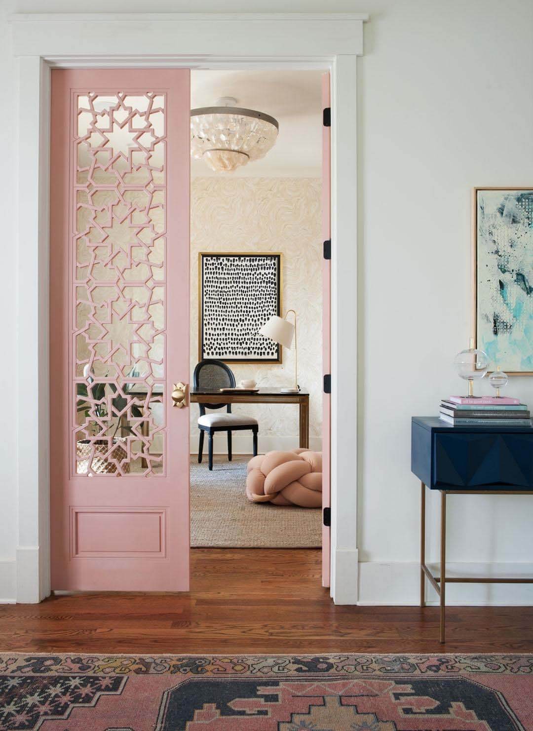 Pink door with Moroccan accents leading into home office